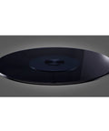 Heavy Duty Tempered Glass Lazy Susan Roller Tray Matte Black 31 Inch Round Dining Table Spinner viewed from above, smooth glossy surface.