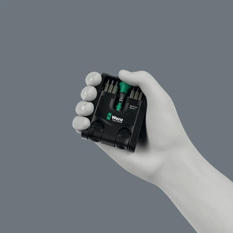 Hand holding Modular Micro 21-Piece Tool-Check Bit Set With Bit-Holding Screwdriver, showcasing compact size and ultra compact 4 mm hex drive.