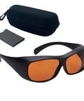 Professional Grade Kickass Laser Safety Glasses With Hella Od5 Plus Eye Defense Across One Hundred Ninety To Eleven Hundred Nanometer Wavelength Range For Spa Studios And Beauty Clinics In Classic Orange Lens with case and cloth.
