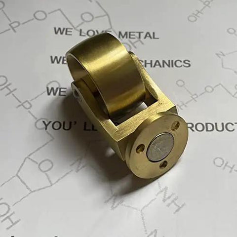 Pro Level Solid Brass Swivel Castor Wheels Set Of Four Featuring Tough As Nails Iron Cores And Slick Antique Gold Finish With No Fuss Setup on a patterned background.