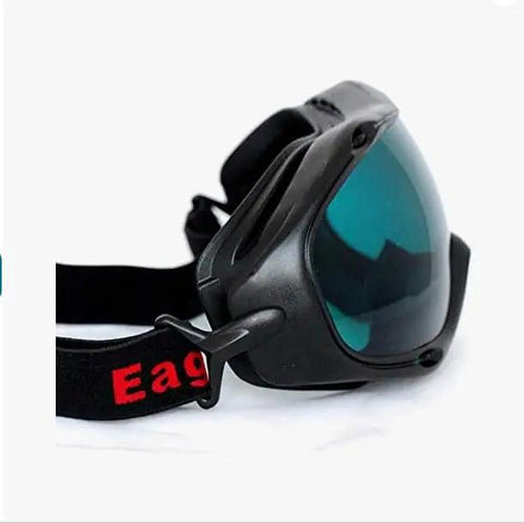 Pro Grade Wide Spectrum Laser Safety Glasses Featuring Rock Solid Optical Density Filtration For Total Uv And Visible Light Studio Workshop Eye Protection Gear side view with a black frame and tinted lenses.