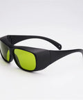 Big Deal Ipl Laser Safety Glasses With Od7 Plus Lens For Spa Owners And Laser Pros Offering Killer Eye Shielding From Eight Hundred To One Thousand One Hundred Nm In Solid Green Rims, showing side view on a clean background.