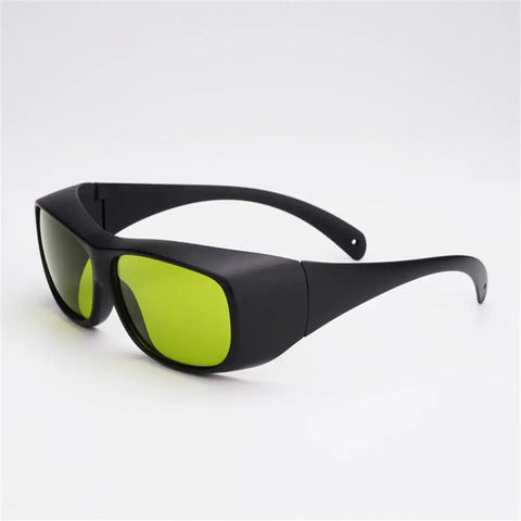 Big Deal Ipl Laser Safety Glasses With Od7 Plus Lens For Spa Owners And Laser Pros Offering Killer Eye Shielding From Eight Hundred To One Thousand One Hundred Nm In Solid Green Rims, showing side view on a clean background.