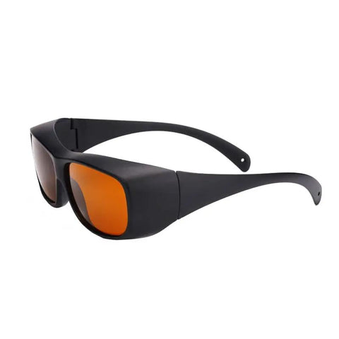 Professional Grade Kickass Laser Safety Glasses With Hella Od5 Plus Eye Defense Across One Hundred Ninety To Eleven Hundred Nanometer Wavelength Range For Spa Studios And Beauty Clinics In Classic Orange Lens, side view
