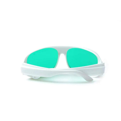 Front view of Red Laser Safety Glasses 635Nm And 808Nm Wavelength Optics with green lenses and white frame for workshop safety.