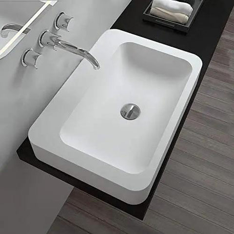 Slick Rectangular Bathroom Vessel Sink Crafted From Heavy Duty Artificial Stone Table Top Basins Featuring Thick Edges That Hold Up Over Years Durable White Countertop Washbasin with modern faucet and sleek design.