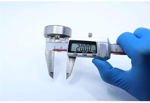 Caliper measuring Heavy Duty One Way Sprag Clutch Bearing Freewheel CSK6004 CSK104 size at 20mm with digital readout.
