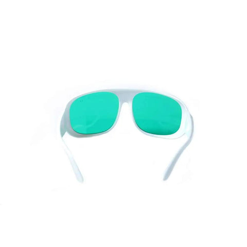 Red Laser Safety Glasses 635Nm And 808Nm Wavelength Optics with green lenses and white frames for secure workshop safety.