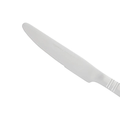 Heavy Duty Stainless Steel Flatware Set Packed With Twenty Piece Silverware Collection Dishwasher Safe Service For Four Bistro Style Dinner Cutlery That Goes Hard Every Night And Makes Cleanup A Total Snap knife close-up, stainless steel, serrated edge, designed for dining.