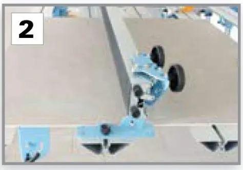 Beefy Professional Grade Large Format Panel Tile Cutter Up To 130 Inches Long With Scratch Resistant Rubber Bed showing rubber coated scoring beam and wheels.