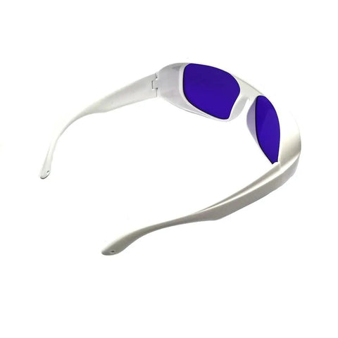Heavy Duty Yellow Laser Safety Glasses Serving Straight Up Tough Eye Armor For 560 To 600nm Wavelengths With OD 6 Plus Coverage Built Rock Solid For Pro Labs And Tech Shops side view with purple lenses.