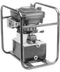 Badass Gasoline Powered Hydraulic Pump Pumps Out 10000 Psi with steel roll cage for durability, ideal for rough job sites.