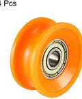 Hella Smooth V Groove Pulley Wheels With Precision Ball Bearing Rollers For Zero Headache Project Builds And Sleek Glide Action Orange Six Thirty Thirteen Millimeter Four Pack, showcasing a close-up of one orange pulley with bearing.