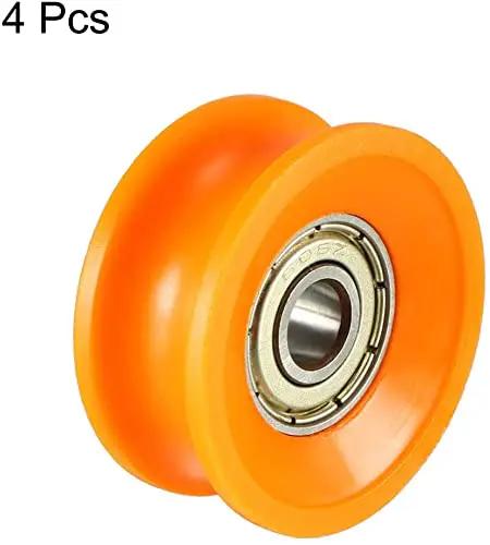 Hella Smooth V Groove Pulley Wheels With Precision Ball Bearing Rollers For Zero Headache Project Builds And Sleek Glide Action Orange Six Thirty Thirteen Millimeter Four Pack, showcasing a close-up of one orange pulley with bearing.