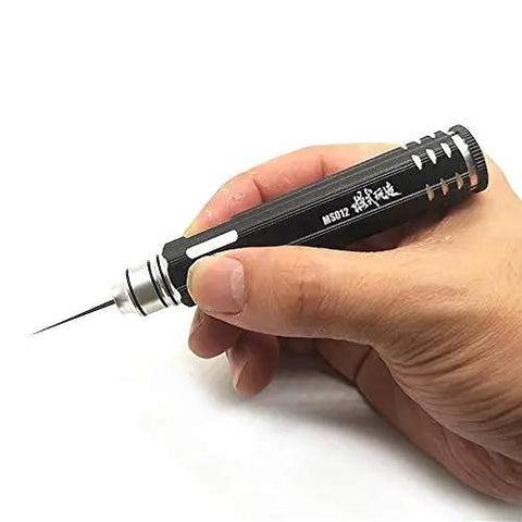 Hand holding Top Shelf Tungsten Steel Scriber Blades with precise tip, ideal for smooth panel line drafting and engraving work.