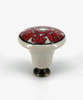Slick Hand Painted Ceramic Furniture Knobs With A Fresh Red And Grey Finish Offering Boss Vintage Vibes Perfect For Sharp Drawer Handles. Close-up of red and white ceramic knob.