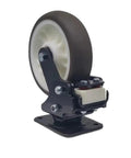 4 Inch Shock Absorbing Swivel Caster With Synthetic Rubber Tread And Nylon Hub Rigged As Heavy Duty Industrial Grade Wheels on a metal base.