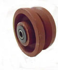 Bulletproof Four Inch Two Inch V Groove Caster Wheel With Seven Eighths Stem Crafted From Rugged Ductile Steel And Rollin Smooth On Heavy Duty Bearings For A Rock Solid One Five Zero Zero Pound Load Rating In Classic Burgundy, close-up view.