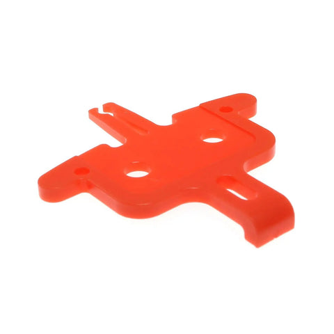 Six Piece Bicycle Brake Pad Spacer Kit For Hydraulic Disc Brakes, Pad Spreader Insert Tool, red plastic spacer, angled view