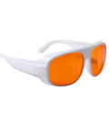 Heavy Duty Laser Safety Eyewear Featuring Badass OD5 Plus Defense Against UV And Green Lasers Covering 180 To 540 Nm Range with orange lenses.