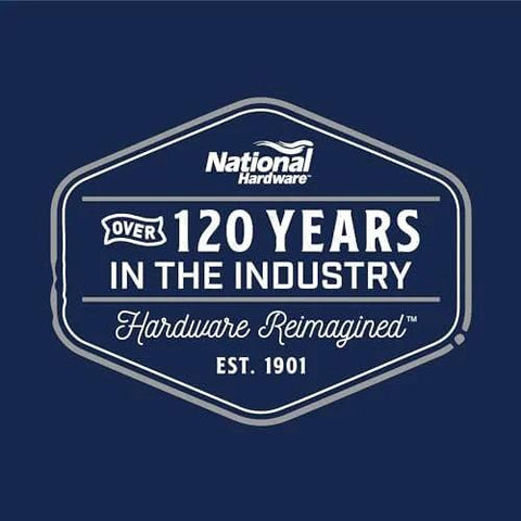 Blue badge logo for National Hardware, over 120 years in the industry, established in 1901, with slogan 'Hardware Reimagined.'