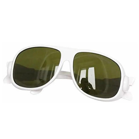 Top Tier Laser Safety Eyewear For IPL Photon Beauty Routines with white frame and green tint lenses for UV protection.