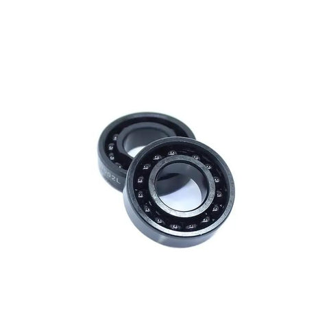 Two Piece 6902 Thin Ball Bearings 15x28x7mm Rated For 500 Degree Heat Built Damn Tough For Industrial Machines on a white background.