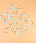 Paper Rattan Scarf Hanger With 12 Foldable Rings For Wardrobe And Closet Organization Keep Your Fits Tight With This Dope Hijab Holder And Tie Rack Zero Clutter Vibes Guaranteed multicolor rack with 12 woven rings.