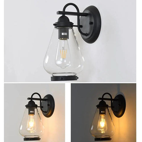 Sharp Badass Hella Waterproof Outdoor Wall Lantern With Slick Clear Glass Shade And Tough Diecast Aluminum Build For Front Porch Or Backyard Vibes Fits E27 Right Now Tonight mounted on a wall, illuminated with warm light.