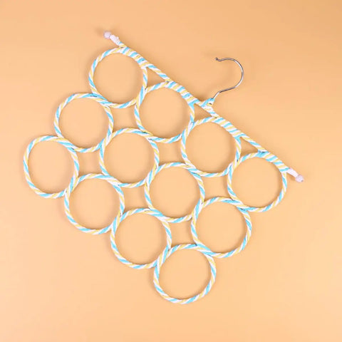 Double Sided Scarf Hanger Closet Organizer Foldable Paper Rattan 12 Ring Tie Holder with blue and white twisted rings.
