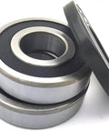 Kick Some Noise To The Curb With This Premium Washer Tub Bearing And Seal Replacement Kit For FTF530 Models, close-up of metal bearings.