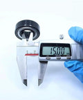 Badass High Temp 6202ZZ Deep Groove Ball Bearings 15X35X11MM being measured at 15mm diameter with caliper.