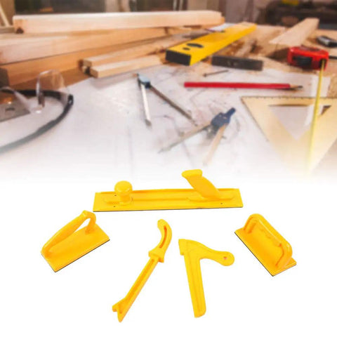 Rock Solid Pro Level Woodworking Push Block And Push Stick Set Five Piece Safety Jig Kit Featuring Killer Grip Control For Router Tablesaw Band Saw Jointer And Shaper Machines, yellow grips on a workbench.
