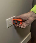 Person using AC Circuit Breaker Kit With GFCI Digital Circuit Breaker Finder Non Contact Voltage Tester Pen Zipper Bag 3 Piece Set For Quick Panel Checks Live Wire Alerts And Safe Home Electrical Troubleshooting to test an electrical outlet.