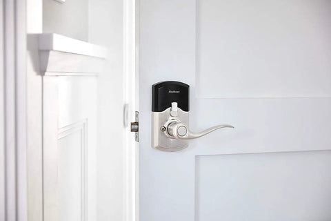 SmartCode 917 Keypad Keyless Entry Lever Deadbolt For Home In Satin Nickel Residential Electronic Lock shown on door