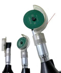 Knockout Compact Angle Grinder With A Solid 90 Degree Elbow Head For Tough Cutting Grinding And Polishing In Tight Squeezes Backed By Reliable Dual Voltage Muscle angled view with green cutting disc.