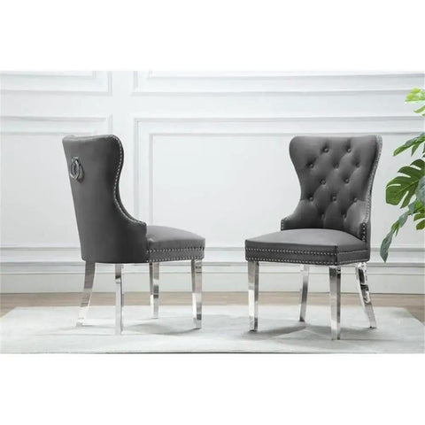 Turn Up Your Hosting Game With This Six Piece Round White Marble Dining Set Featuring A Smooth Lazy Susan Silver Stainless Steel Base And Four Plush Charcoal Velvet Seats For A Straightup Flex Setup - Two plush gray velvet dining chairs with button tufting.
