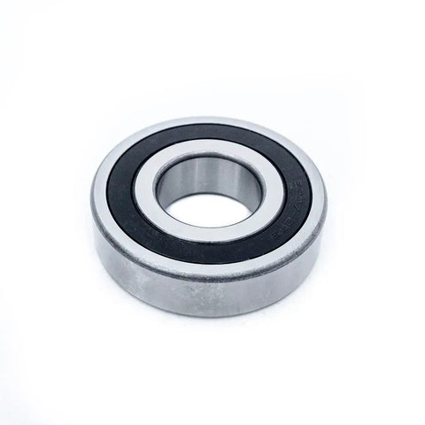 Top Shelf Heavy Duty Washer Tub Bearing And Seal Kit for a No Sweat Home Appliance Fix replacement part, metal bearing with black seal, round shape.