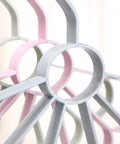 Fan Shaped Closet Rod Organizer For Ties Scarves And Hats Made From Sturdy Polypropylene showcasing grey and pink design.
