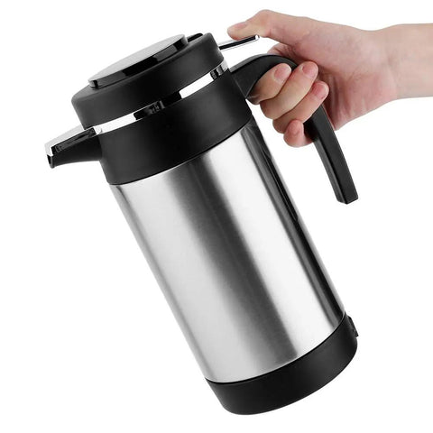 Road Ready Setup 1000 Milliliter Stainless Steel 12 Volt Car Kettle Keeps Brews Piping Hot With A Dripfree Seal and Auto Temp Hold Feature For Long Haul Drives Nationwide, held by hand.