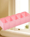 Stackable Plastic Drawer Organizers In Snazzy Pink For Crushing Closet Clutter And Laid Back Home Storage Setup Great For Sock Sorting Underwear Tote Bins And Daily Essentials displayed near a window.
