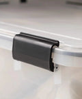 Close-up of black snap latch on Heavy Duty 62 Quart Storage Tote With Secure Seal Lid And Six Rugged Snap Latches.