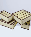 Total Closet Game Changer Non Woven Bra Storage Organizer With Multi Grid Layout Smooth Drawer Setup For Underwear Socks Ties And Scarves Beige Four Pack stacked view with grid compartments.
