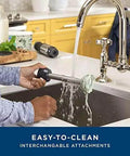 No Sweat 500 Watt Stainless Steel Immersion Blender With Removable Whisk And Spout Blending Jar For Thick Smoothies Quick Purees And Bold Homemade Sauces Dual Speed Hand Blender Kit being rinsed in a sink.
