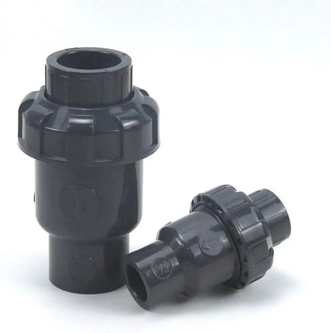 Heavy Duty Upvc Check Valve With Slick Spherical Seal And Knockout One Way Flow Control Ideal For Vertical Plumbing Installations That Crush Acid Exposure And Block Backflow Dead - two sizes visible
