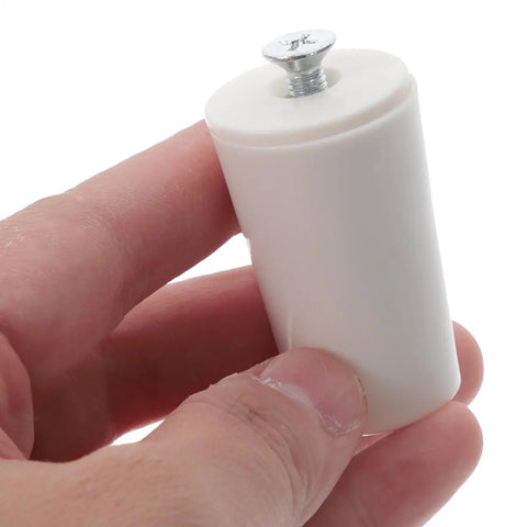 Close-up of white plastic roller shutter stop held in hand, part of the Seal The Deal On Window Upgrades With These Knockout Roller Shutter Stops Built To Keep Blinds And Shades Locked In Tight Prevent Over Rolling While Delivering Super Smooth Operations.