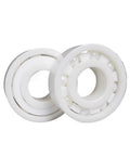 Premium Zirconia Ceramic Bearings For Ridiculously Smooth Rolling And Zero Rust Headaches With Heavy Duty Construction That Totally Slays Steel Components In Every Motor Assembly 60 By 110 By 22 Millimeter Pack Of Five Pieces, showcasing two white ceramic ball bearings.