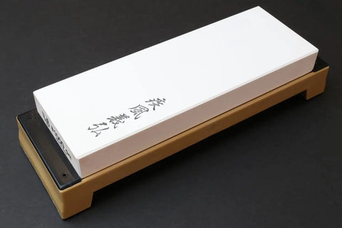 Pro Grade Japanese Whetstone Sharpener 1000 Grit Water Stone For Knives 8x2.85x0.9 Inch with base on black surface