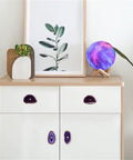 Level Up Your Fresh Setup With These Dope Agate Stone Cabinet Drawer Knobs Showcasing Clean Gold Plated Edges And No Hassle Screw Mount For Dressers Wardrobes Or Vanities on white cabinet.