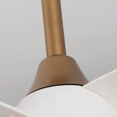 Close-up of the brass body of a compact ceiling fan with remote and LED light for bedroom and covered patio 28 inch three blade